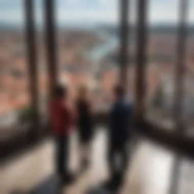 Visitors enjoying the view from the observation deck of the Campanile Tower.